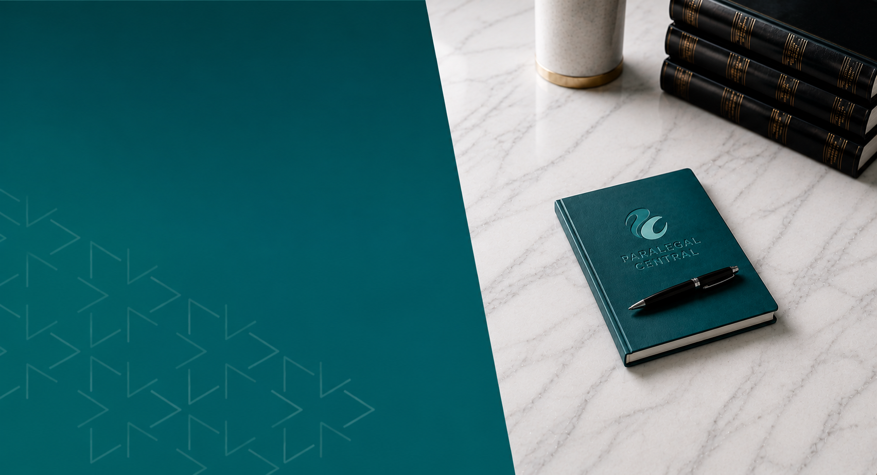 A teal notebook with a logo and text 'Paralegal Central' on a marble countertop, accompanied by a black pen, a white and gold cup, and a stack of black books with gold details.